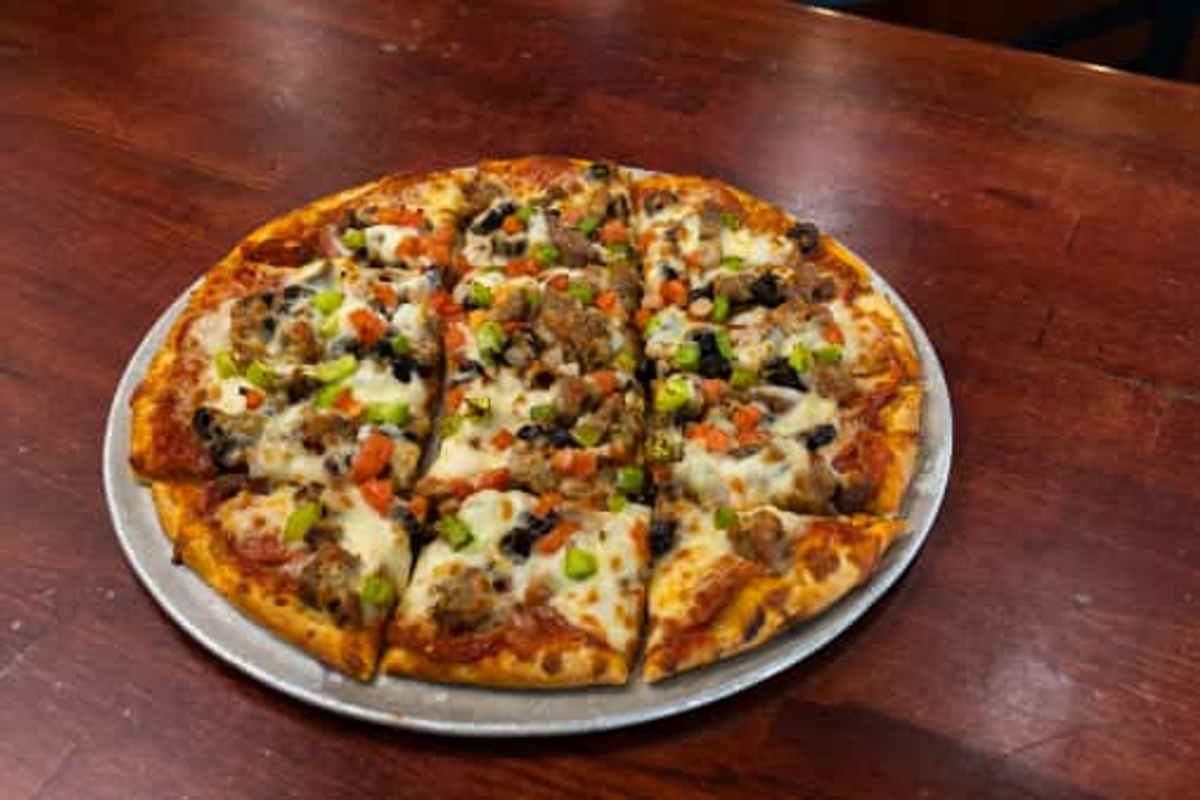 Meet the Boss - The Ultimate Supreme Pizza Experience